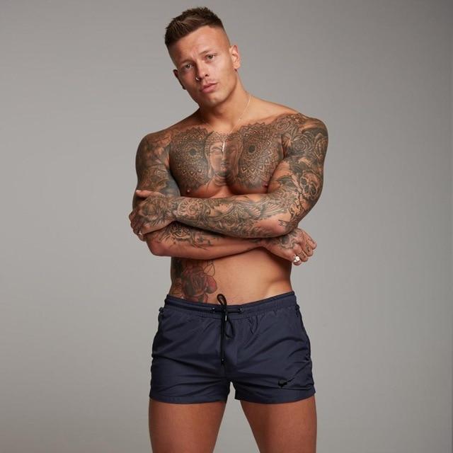 Men's swimming trunks Sexy Swimsuit Men Swim Trunks sunga Hot Briefs Boxer Surf Board Beach Shorts Underwear Bathing Shorts mayo