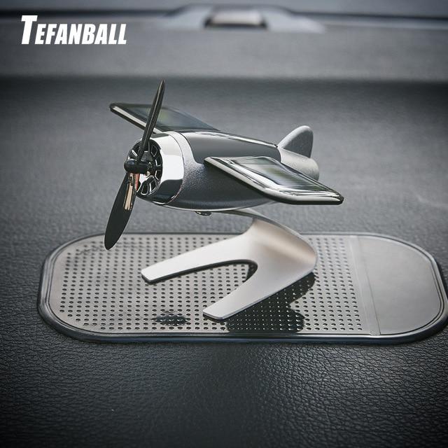 Car Decoration Aromatherapy airplane decoration Non-slip mat alloy Solar energy Rotate aircraft dashboard solid Car styling