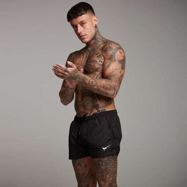 Men's swimming trunks Sexy Swimsuit Men Swim Trunks sunga Hot Briefs Boxer Surf Board Beach Shorts Underwear Bathing Shorts mayo